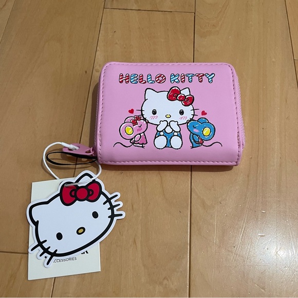 Hello Kitty Handbags - New hello kitty pull and bear pink wallet